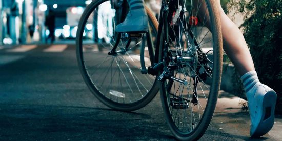 peddling on a road bike in the city